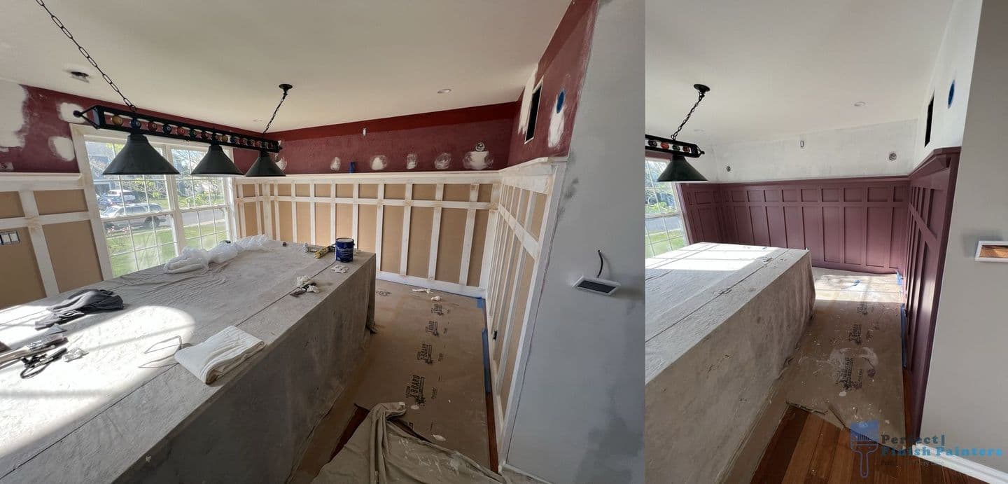 Before-and-after view of a room with paneled walls, showing unfinished beige panels on the left and freshly painted deep maroon panels on the right, with protective coverings on the floor and counter.